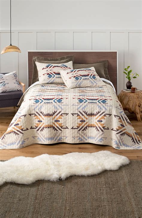 99 Pendleton Sherpa Throw 100 polyester; Reversible one side is printed, the other side is solid. . Pendleton quilt